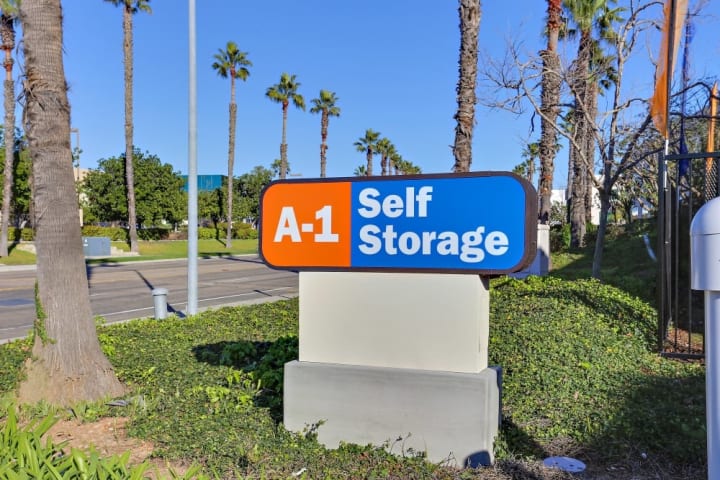 The front sign for A-1 Self Storage in Kearny Mesa welcomes all visitors to the facility along Copley Drive.