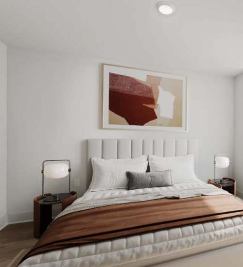 A bed in a bedroom at The Maximillian at Stonefield in Charlottesville, Virginia