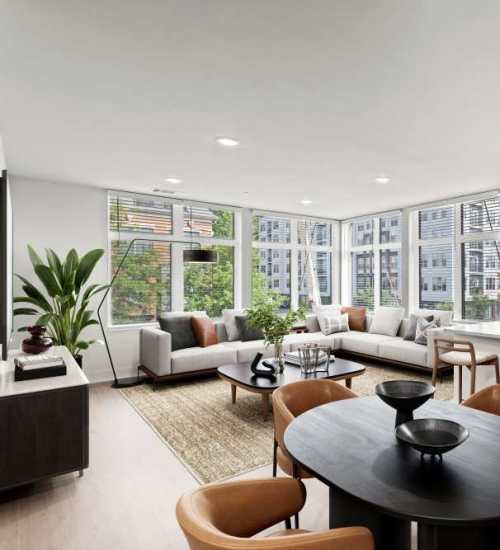 A view of the living room and dinning space at The Maximillian at Stonefield in Charlottesville, Virginia