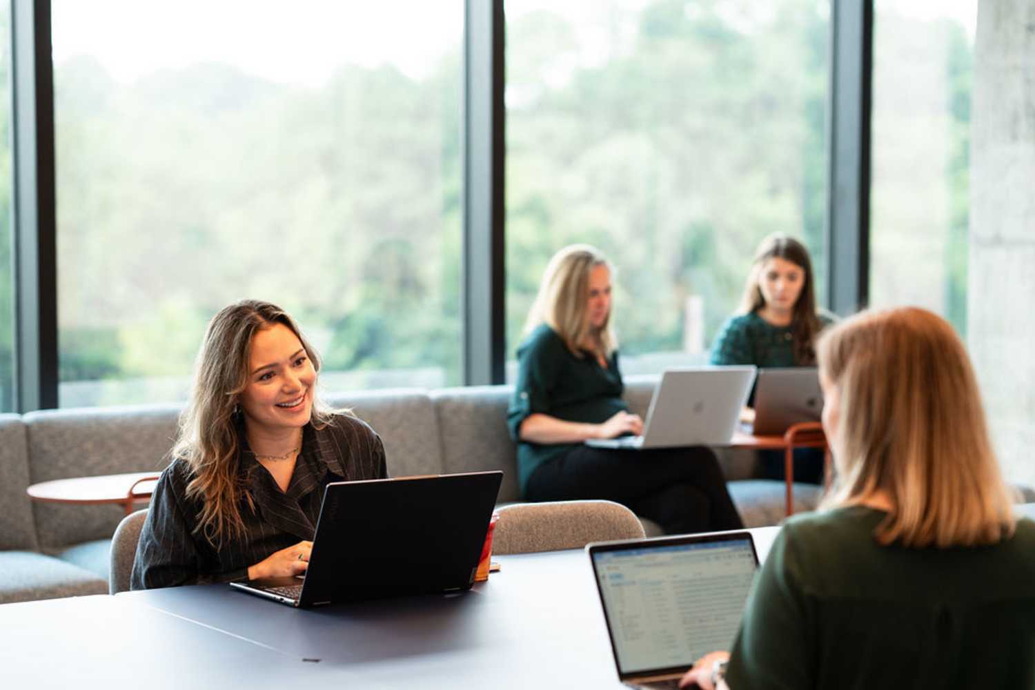 Team members having a meeting at Kane Residential in Raleigh, North Carolina