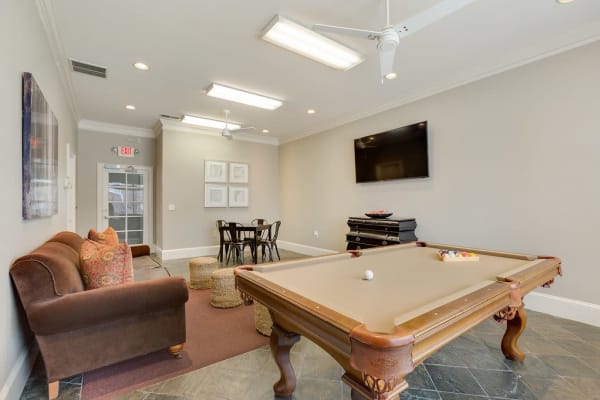 Pool table and flat screen TV at Reserve at Long Point in Hattiesburg, Mississippi