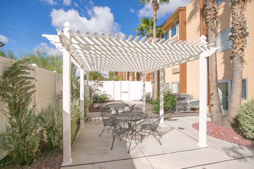 Trelis covering with seating at Sherwood Village Assisted Living & Memory Care in Tucson, Arizona