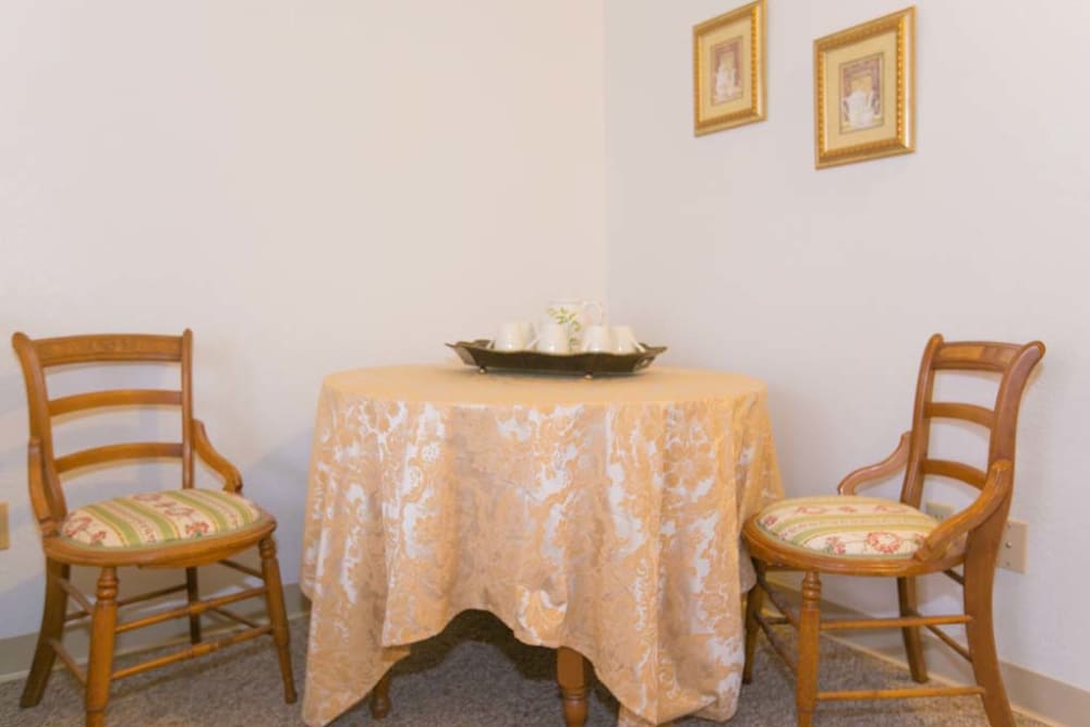 Dining room seating in apartment at Sherwood Village Assisted Living & Memory Care in Tucson, Arizona