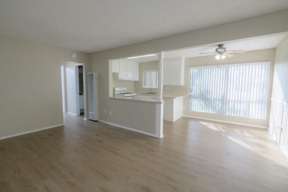 Unit living area and kitchen at Strada Apartments in Orange, California