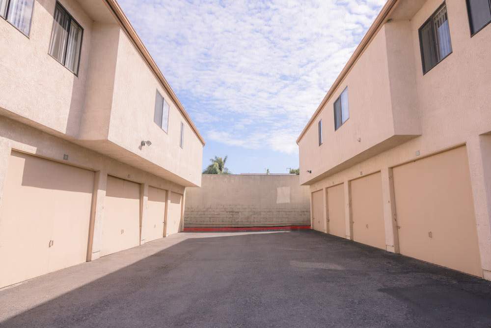 Parking behind units at Wallace Court Apartments in Costa Mesa, California