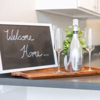 Welcome message board in kitchen at Bridgecreek Apartments in Novato, California