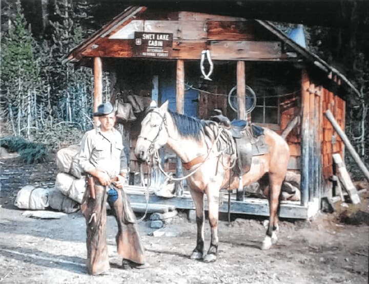 Jim Hickman and horse at Magruder Ranger Station