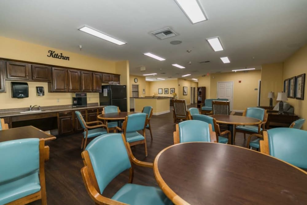 Elegant dining seating at RockBrook Memory Care in Lewisville, Texas