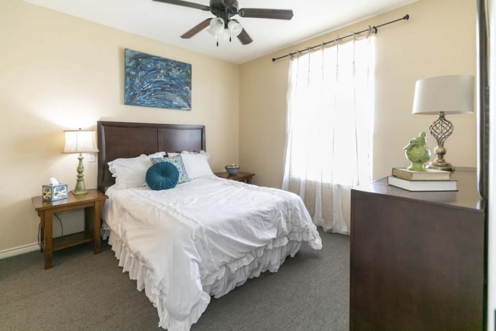 Quaint bedroom at Lakeshore Assisted Living and Memory Care in Rockwall, Texas