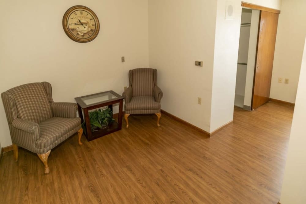 Seating area with hardwood floor at Cedar Hill Senior Living in Cedar Hill, Texas