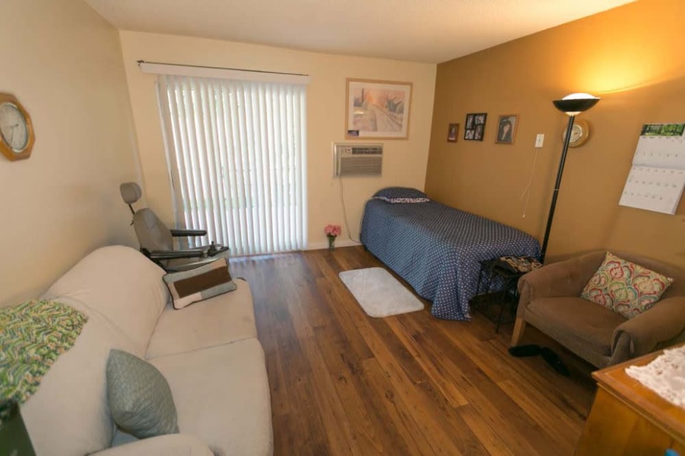 Serene bedroom in apartment at Rose Court in Phoenix, Arizona