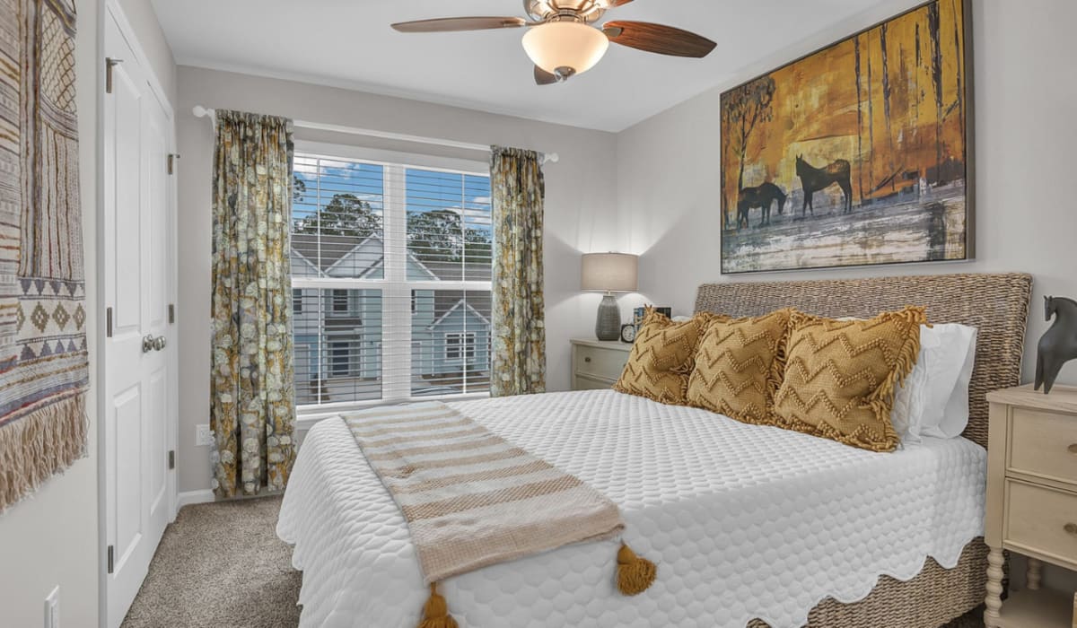 A furnished bedroom at Artisan Living North Beach in Santa Rosa Beach, Florida