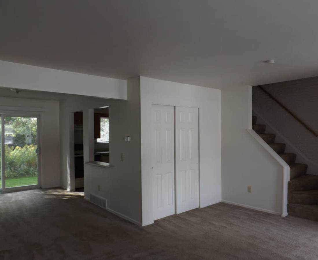 Unfurnished living in a model apartment at Westbrooke Commons Apartments and Townhomes in Rochester, New York