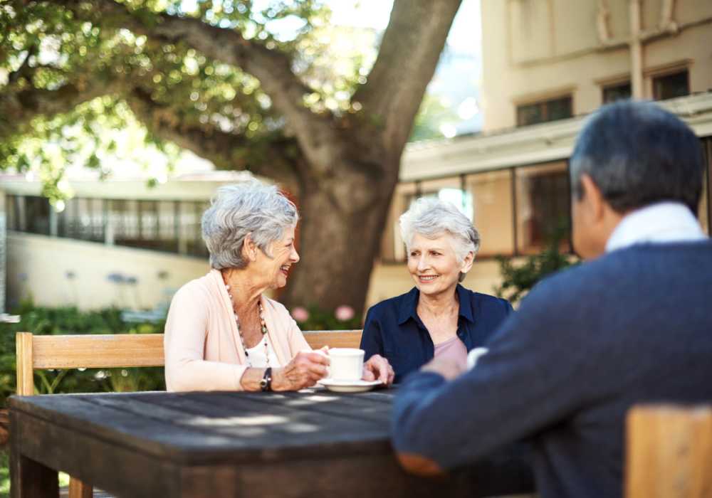 Residents enjoying coffee together at Clearwater Pinnacle Peak in Scottsdale, Arizona