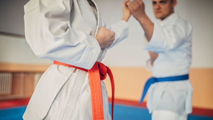 Students sparring in a martial arts class in Keller.