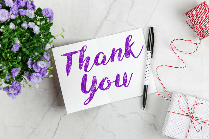 Thank you card with presents and flowers