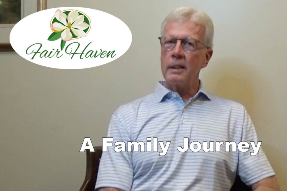 Photo of Jay Pounds, the Fair Haven log and the title A Family Journey