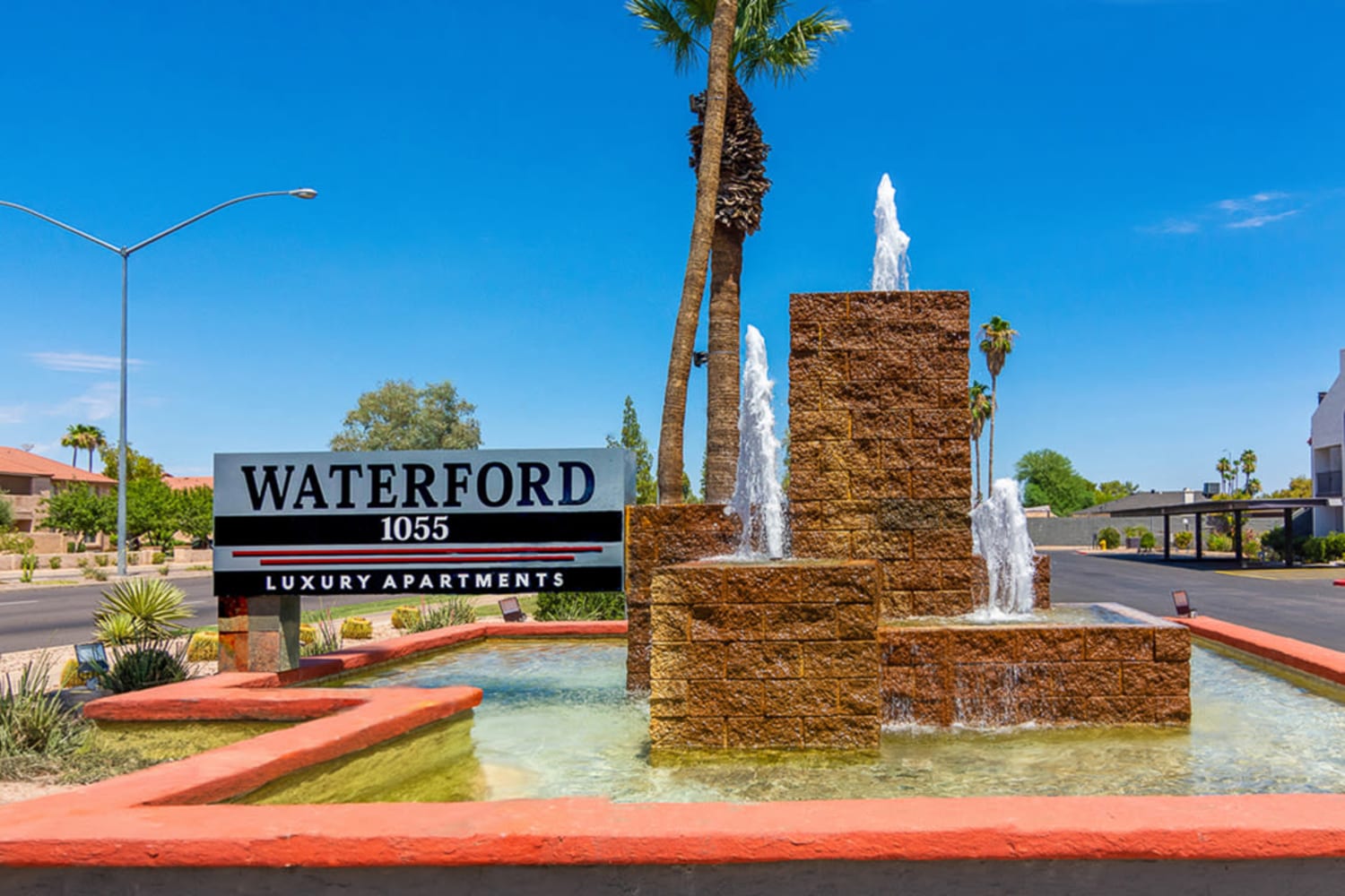 Community entrance and sign at Waterford Place Apartments in Mesa, Arizona
