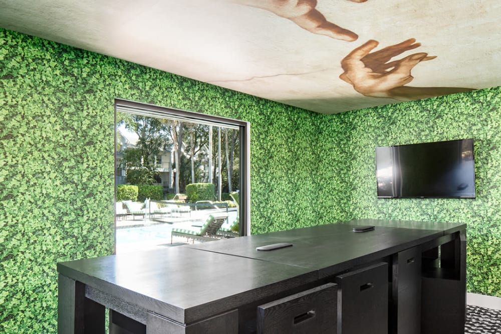 View of the swimming pool area from the clubhouse at The Ivy in Tampa, Florida