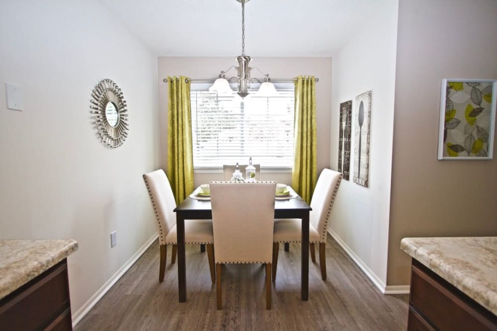 the dining room on a sunny afternoon at Greenbrier Woods Apartments in Chesapeake, Virginia