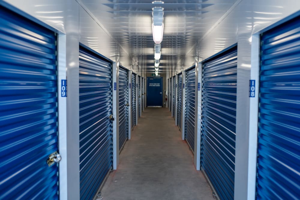 Blue storage indoor unit doors at Apple Self Storage - Peterborough in Peterborough, Ontario