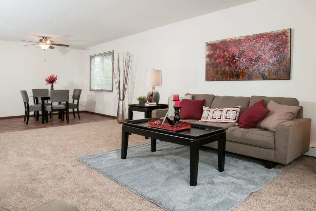 Living room filled with natural light at Valley Place Apartments in Crystal, Minnesota