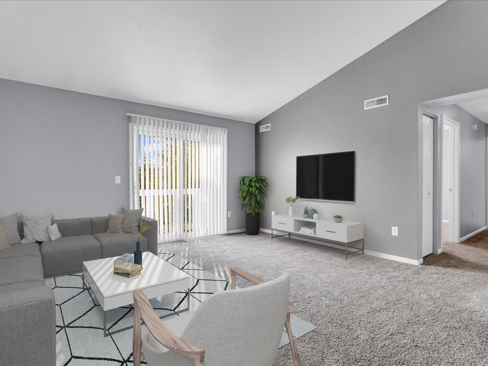 A spacious well furnished living room at River Club in Holland, Michigan 