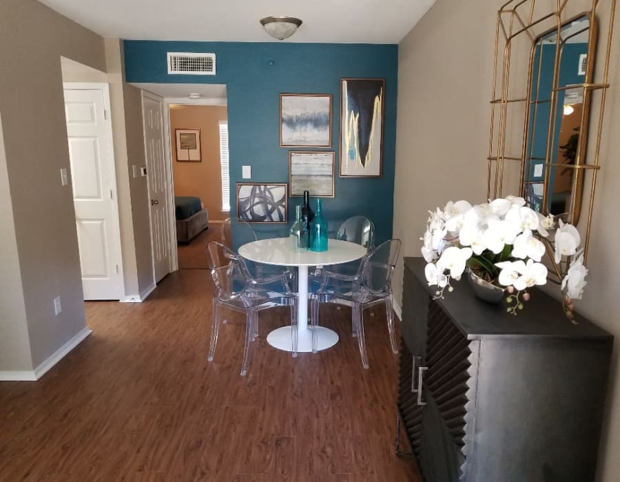 Dining area with hardwood flooring at The Villages at Meyerland in Houston, Texas