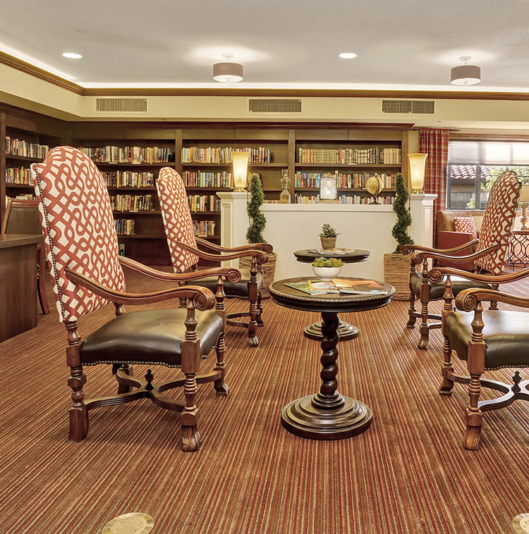 Reading area in the library at The Country Club of La Cholla