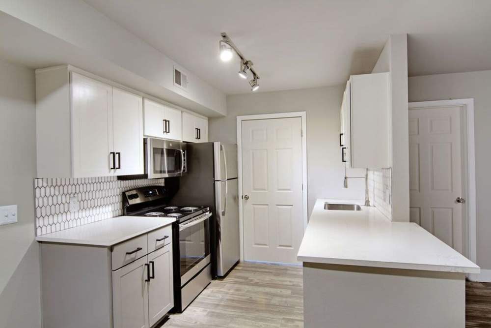 Kitchen with white cabinetries at Paseo Park in Glendale. AZ