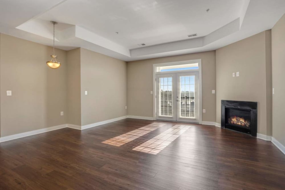 Plank flooring and fireplace at Avanti Luxury Apartments in Bel Air, Maryland