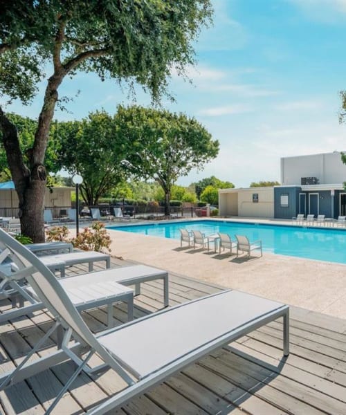 Large pool with poolside lounge chairs at La Silva in San Antonio, Texas