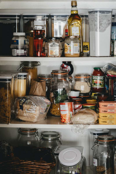 Unorganized pantry shelves