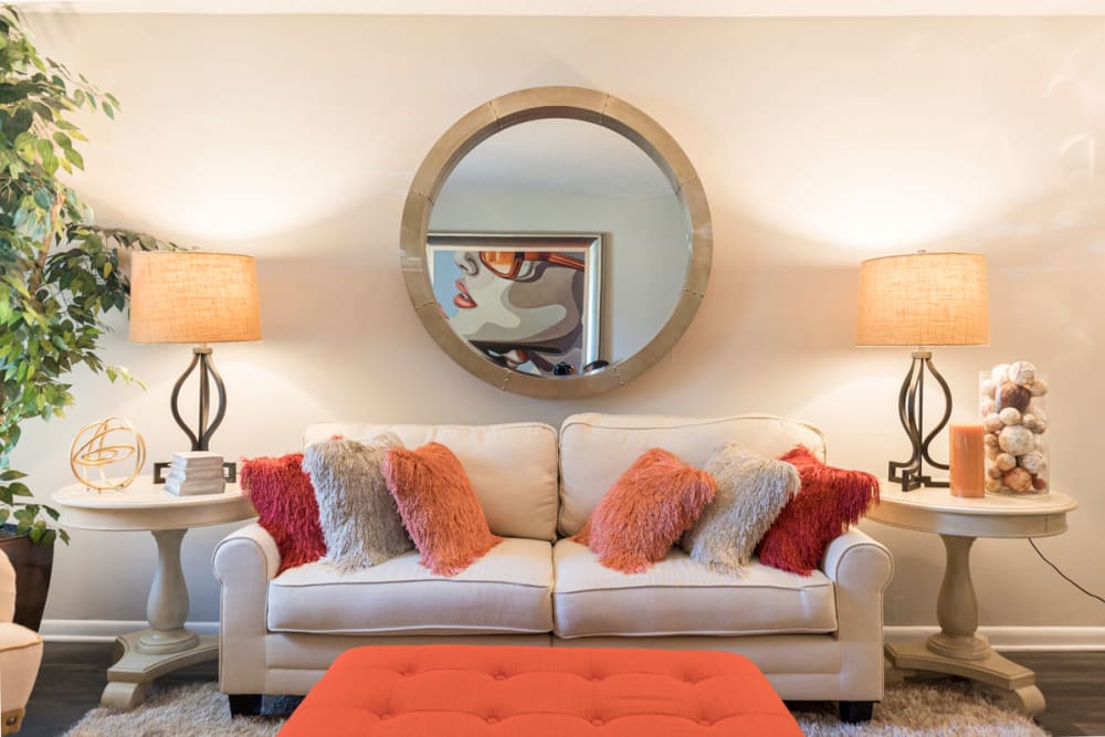 Living room with hardwood-style floors at Old Mill Townhomes in Lynchburg, Virginia