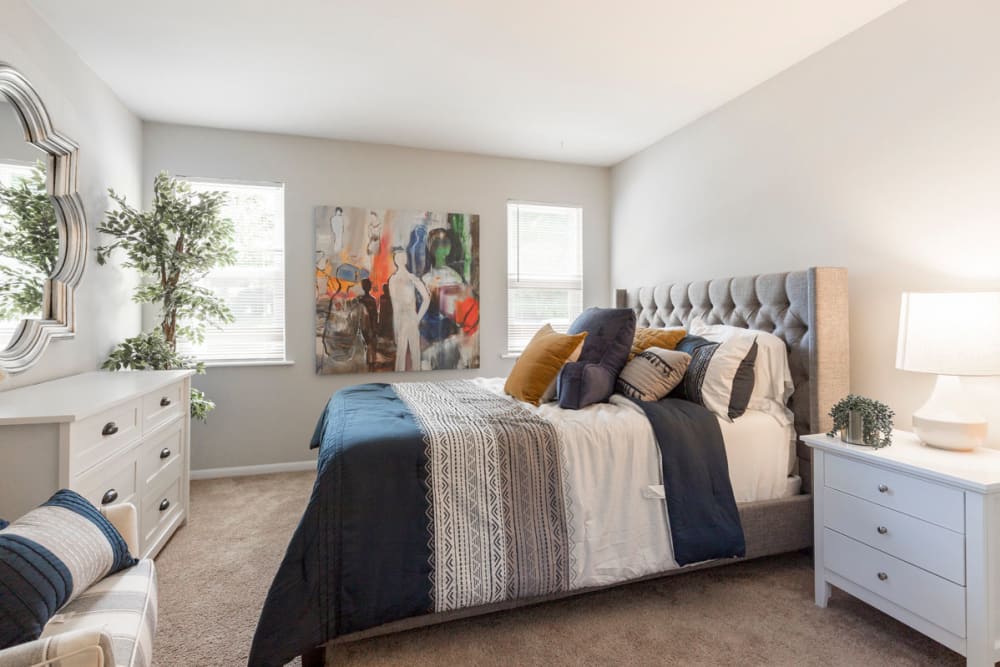 Second floor bedroom with plush carpeting at Old Mill Townhomes in Lynchburg, Virginia
