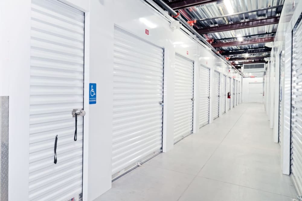 Bright hallways between storage units at Your Storage Units Panama City in Panama City, Florida