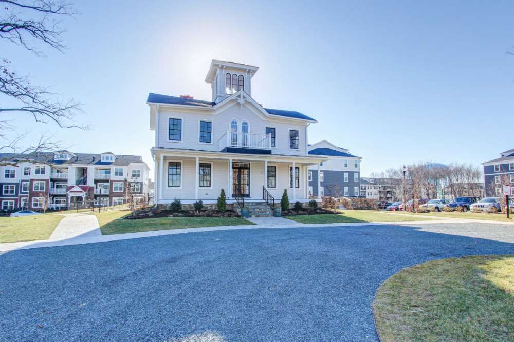 Apartments with parking area at The Elms at Shannon's Glen in Jessup, Maryland
