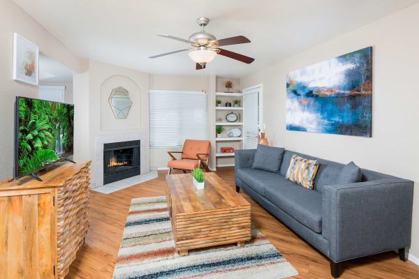 Spacious living room layout with autumn-toned furniture at San Marin at the Civic Center