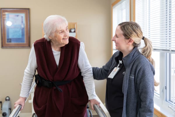Nurse with Touchmark Resident