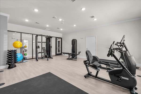 A well-equipped fitness center at Magnolia Living in League City, Texas