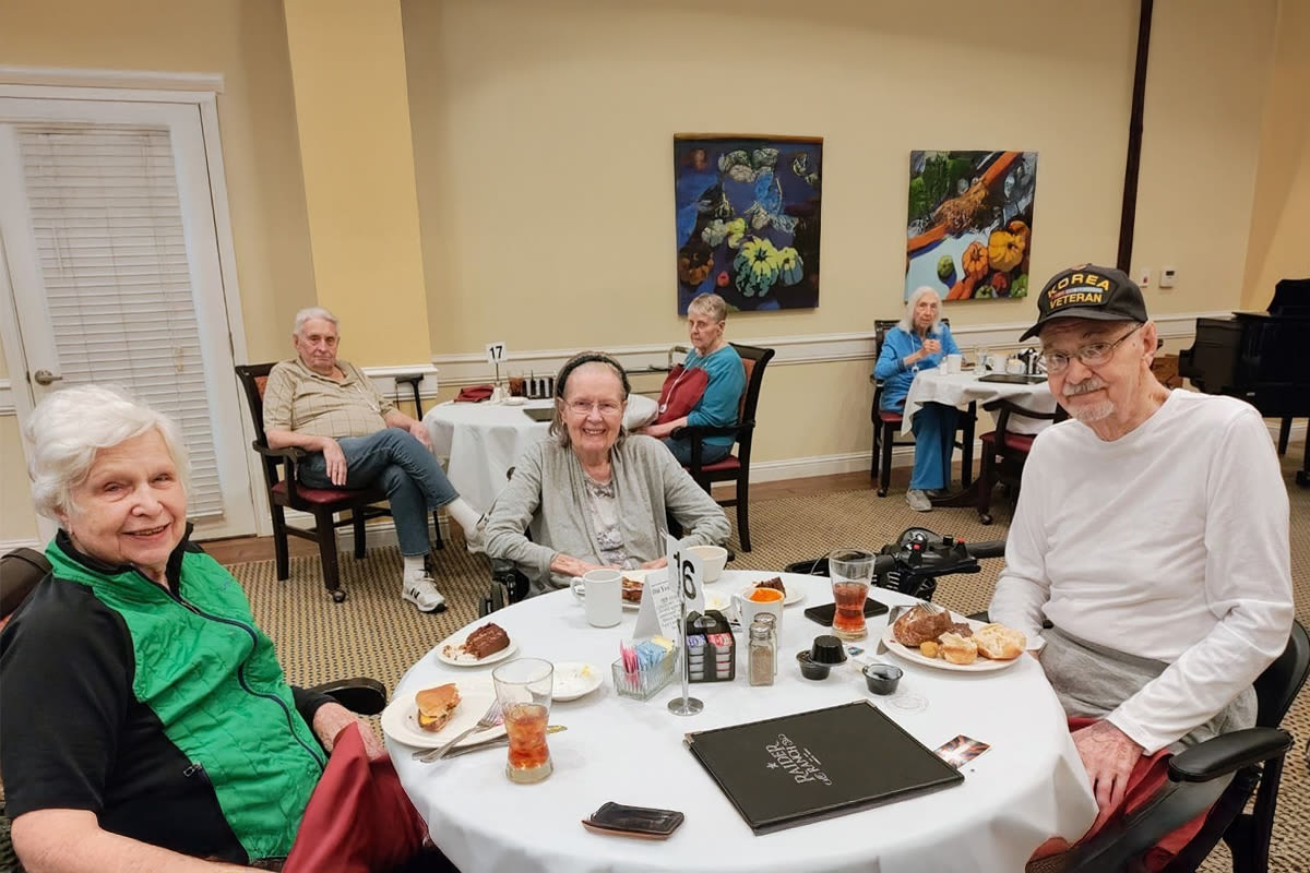 Residents enjoying their meal at Isle at Raider Ranch in Lubbock, Texas