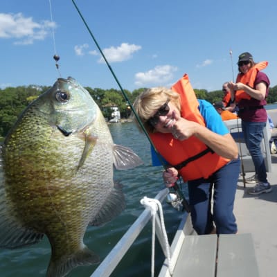 A resident fishing at Ebenezer Ridges Campus in Burnsville, Minnesota