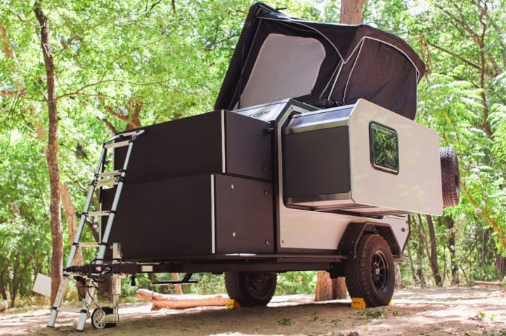 Camper with pull outs extended out