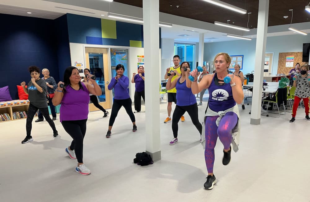 Residents doing work out at Parker Lane Apartments in Austin, Texas