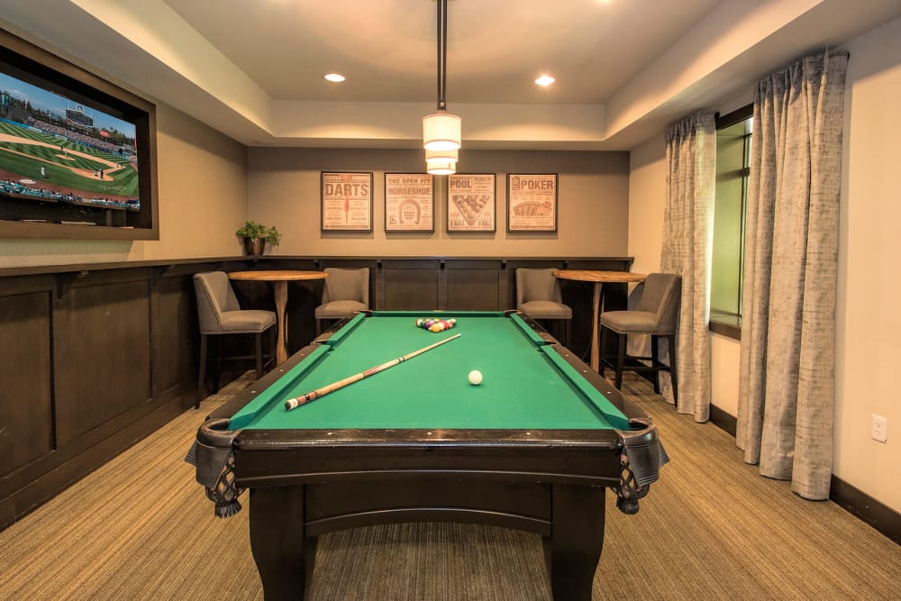 Clubhouse with a pool table at Paragon at Old Town in Monrovia, California