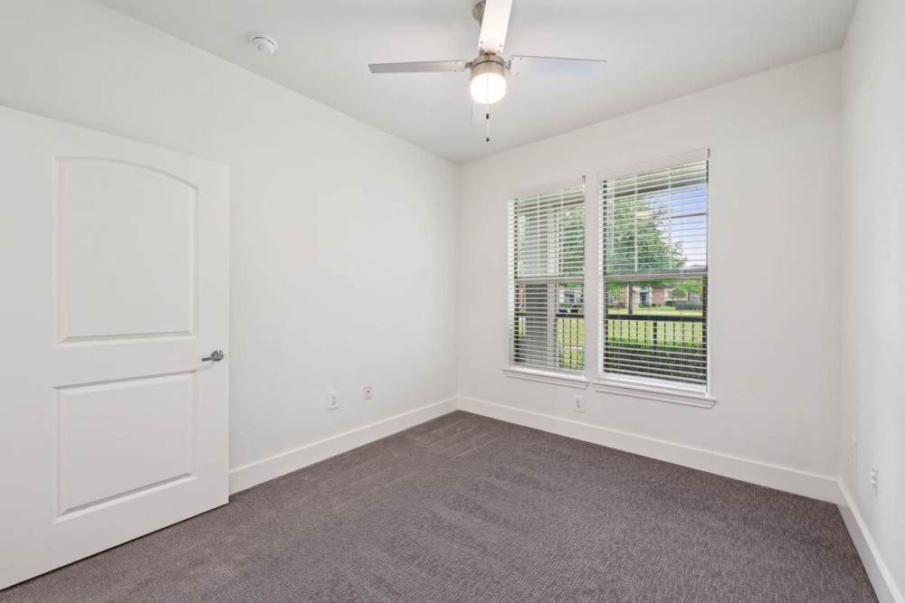 Bedroom with a ceiling fan at Barron Park in Pearland, Texas