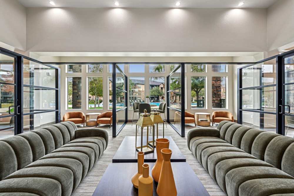 Clubhouse with a comfortable couch at Barron Park in Pearland, Texas