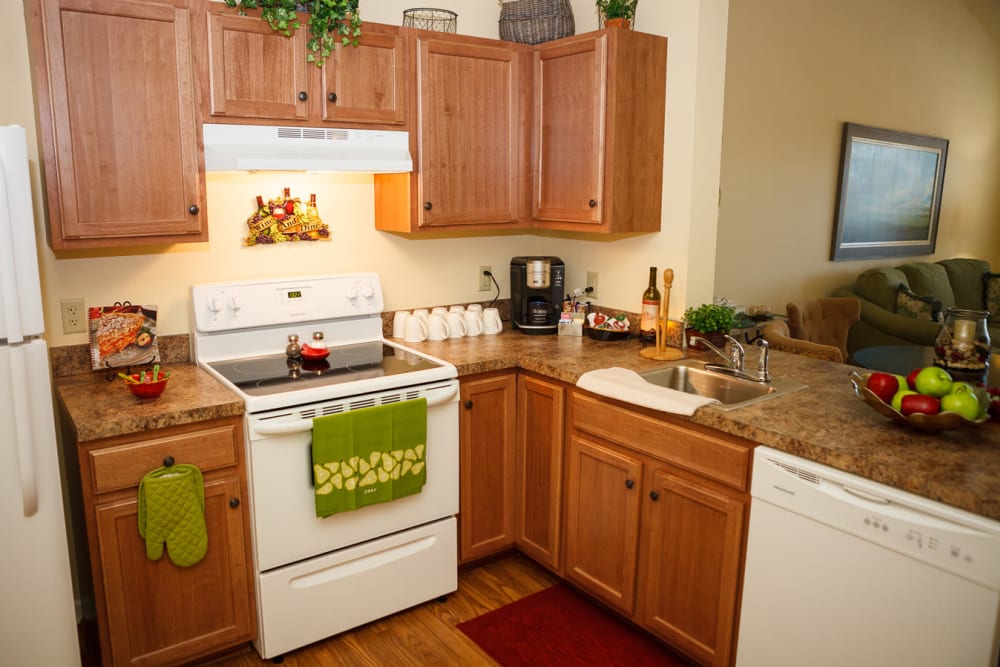 A decorated apartment kitchen at Harmony at Falls Run in Fredericksburg, Virginia