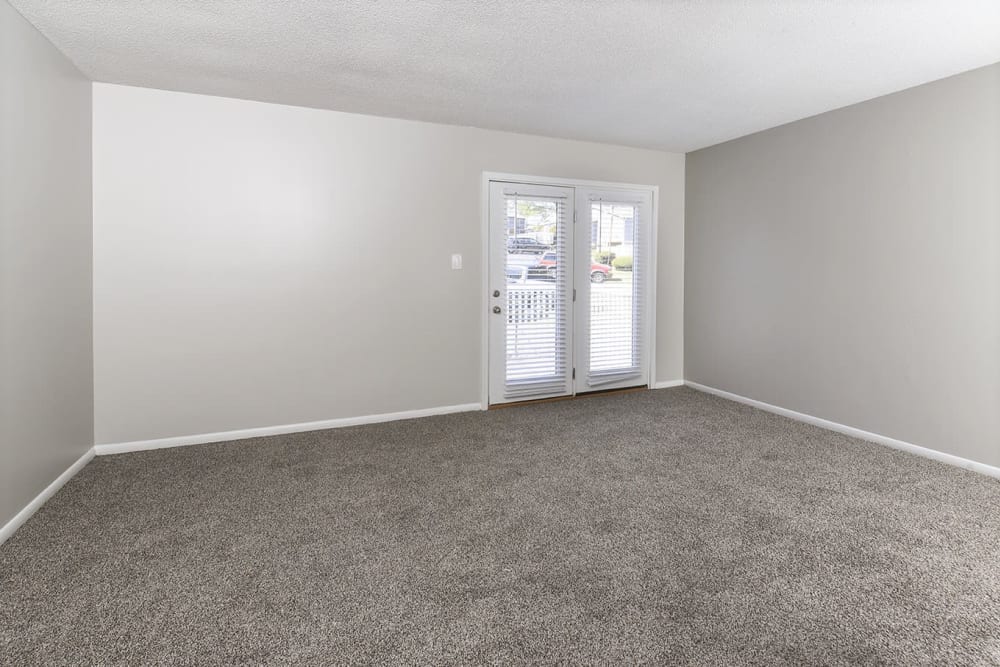 large living area with access to balcony or patio at Homewood Heights Apartment Homes in Birmingham, Alabama