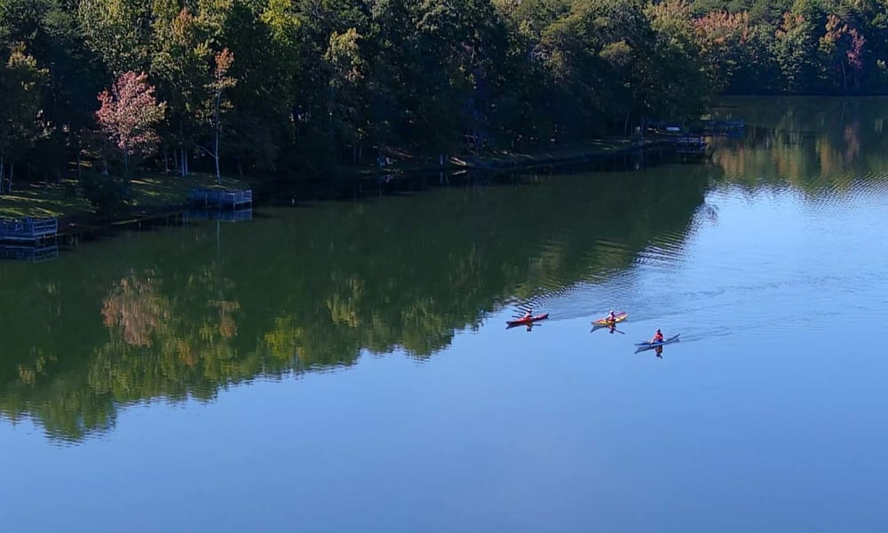 Residents kayaking on a river near Lattitude34 Vines Creek in Greer, South Carolina